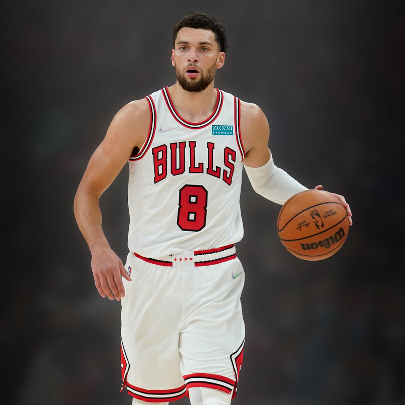 Zach LaVine holding a basketball.